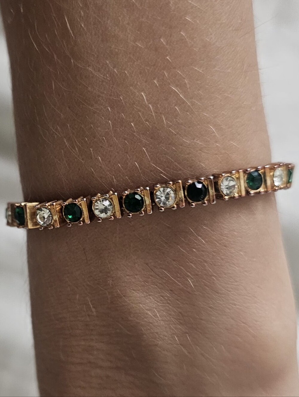 Gold Plated Tennis Bracelet with Emerald Green and Clear Stones